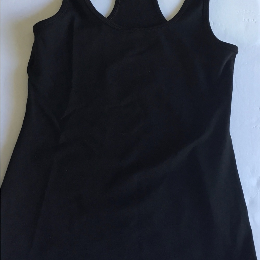 90* by Reflex women black racerback top. Extra small